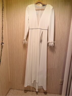 chic Ivory Maxi Dress with Feather Cuffs and Rhinestone Trim